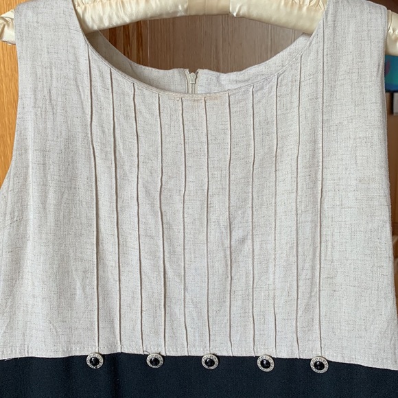 Cream and Black Dress with Elegant Design - Picture 2 of 11